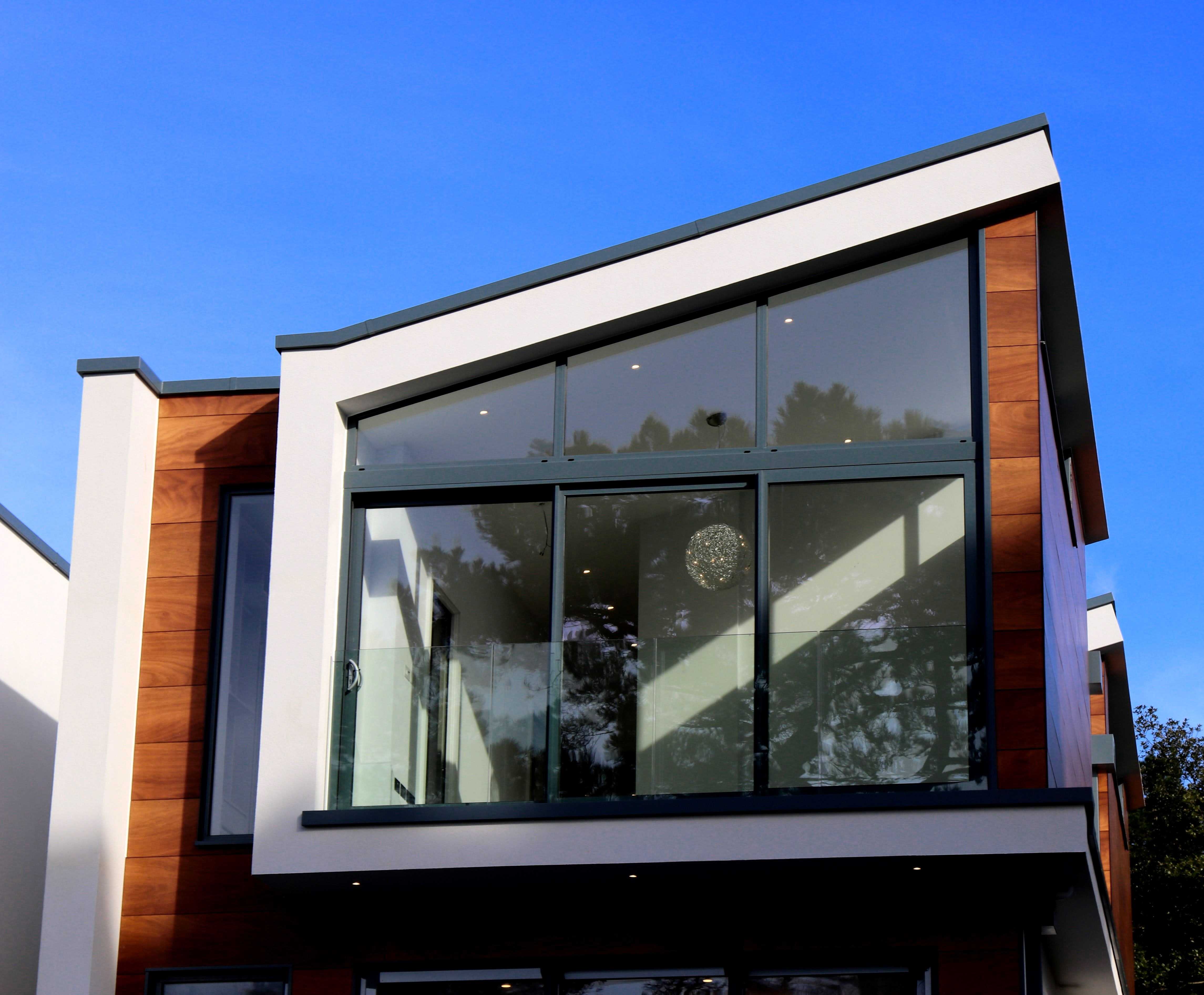 A black and white background of a modern home